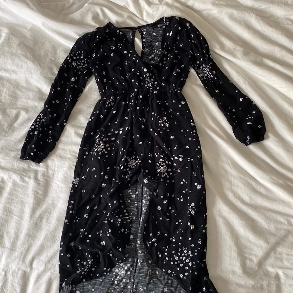 Long sleeve dress with opening in the bottom